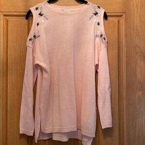 Cold shoulder sweater with cute detail